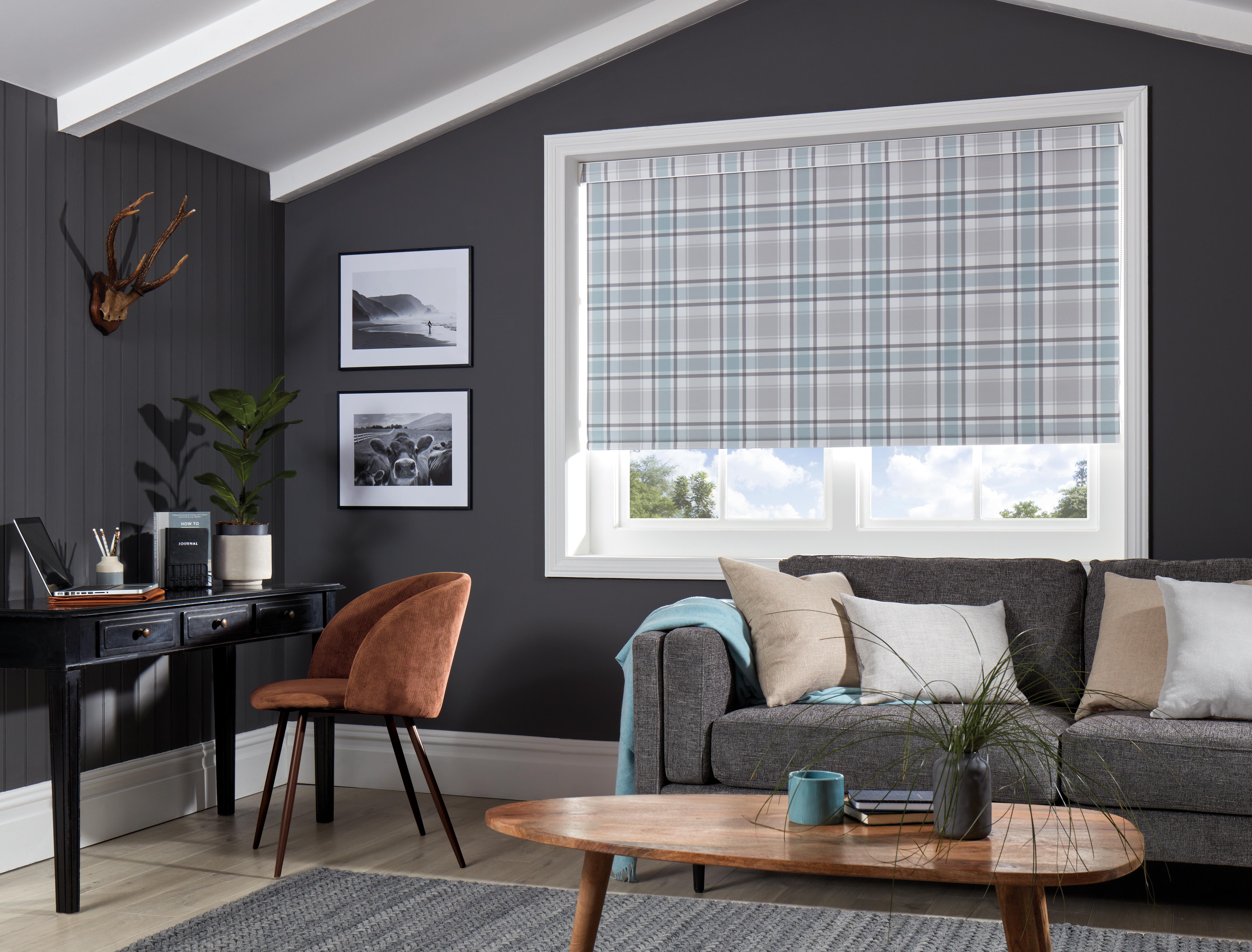 How do roller blinds keep my home cool in the summer?